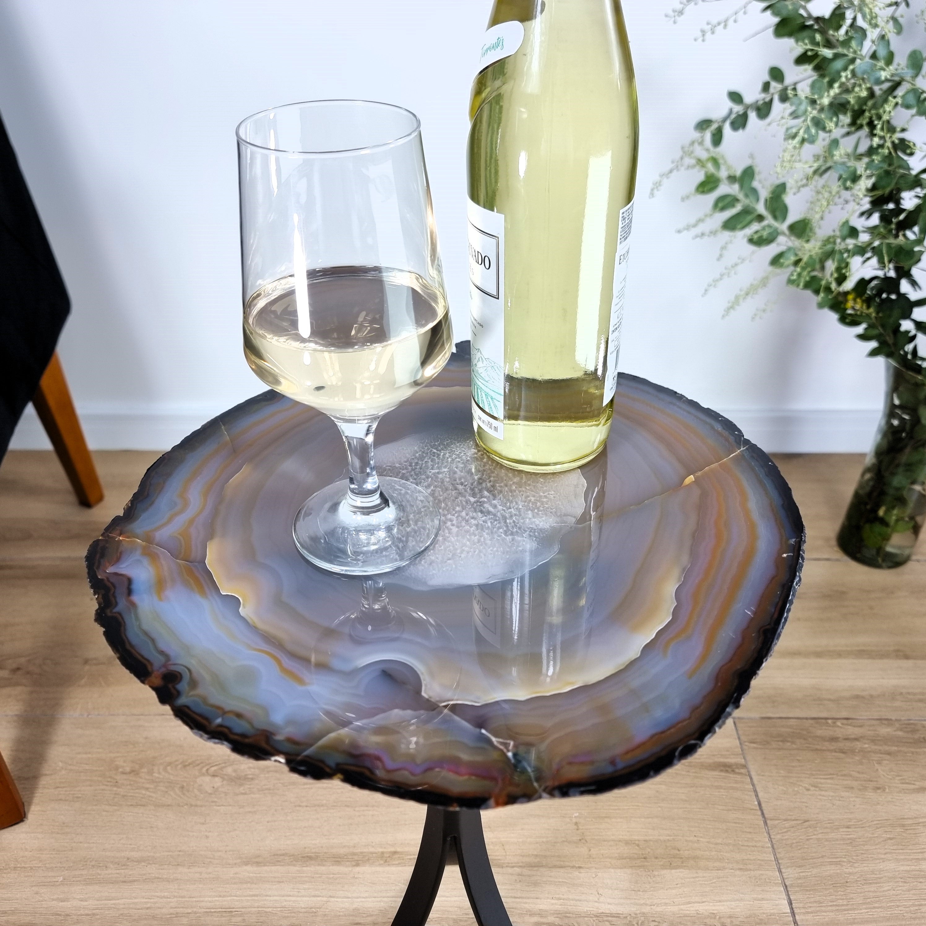 Natural Brazilian Agate Side Table on a black metal base 23 inches high, total weight 11 pounds