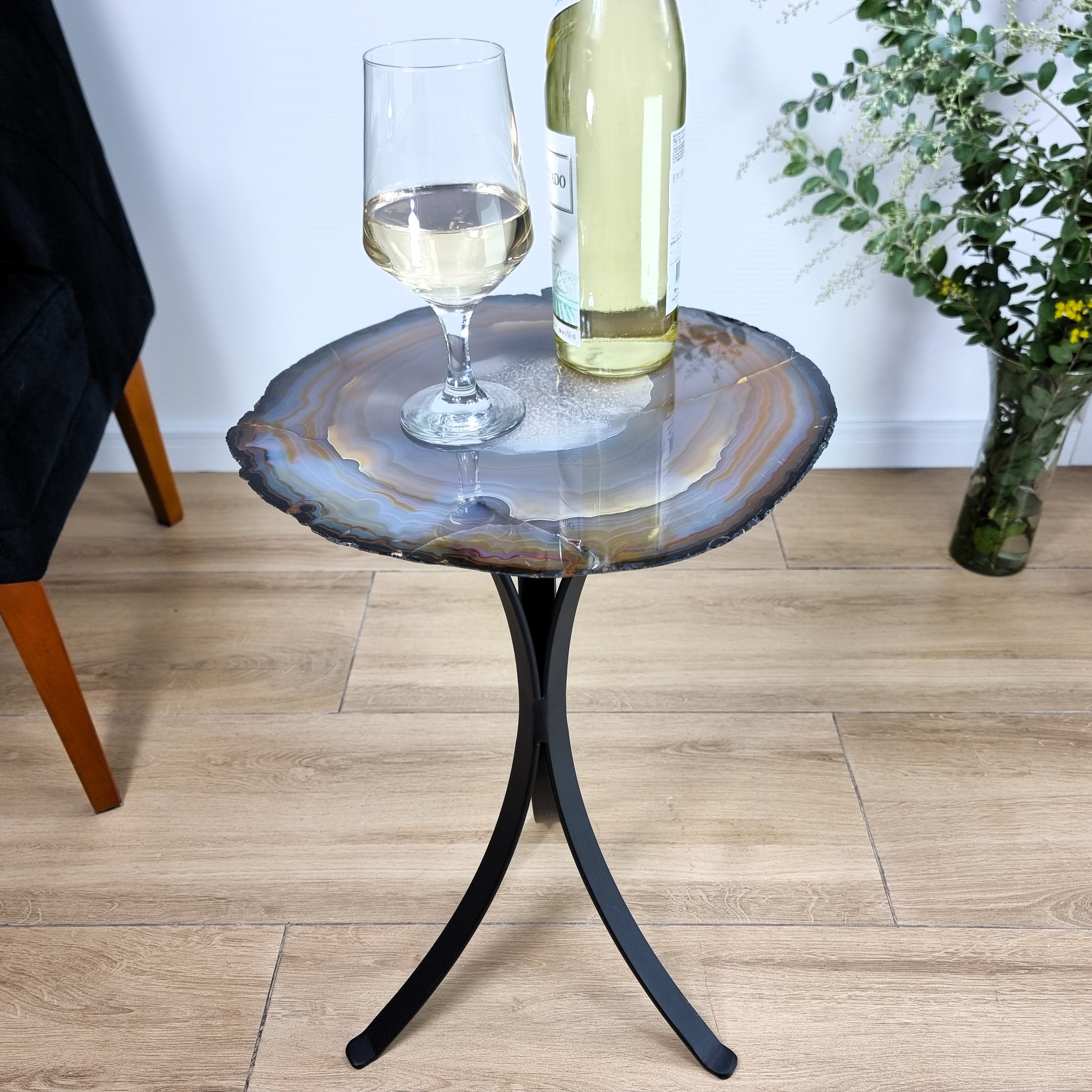 Natural Brazilian Agate Side Table on a black metal base 23 inches high, total weight 11 pounds