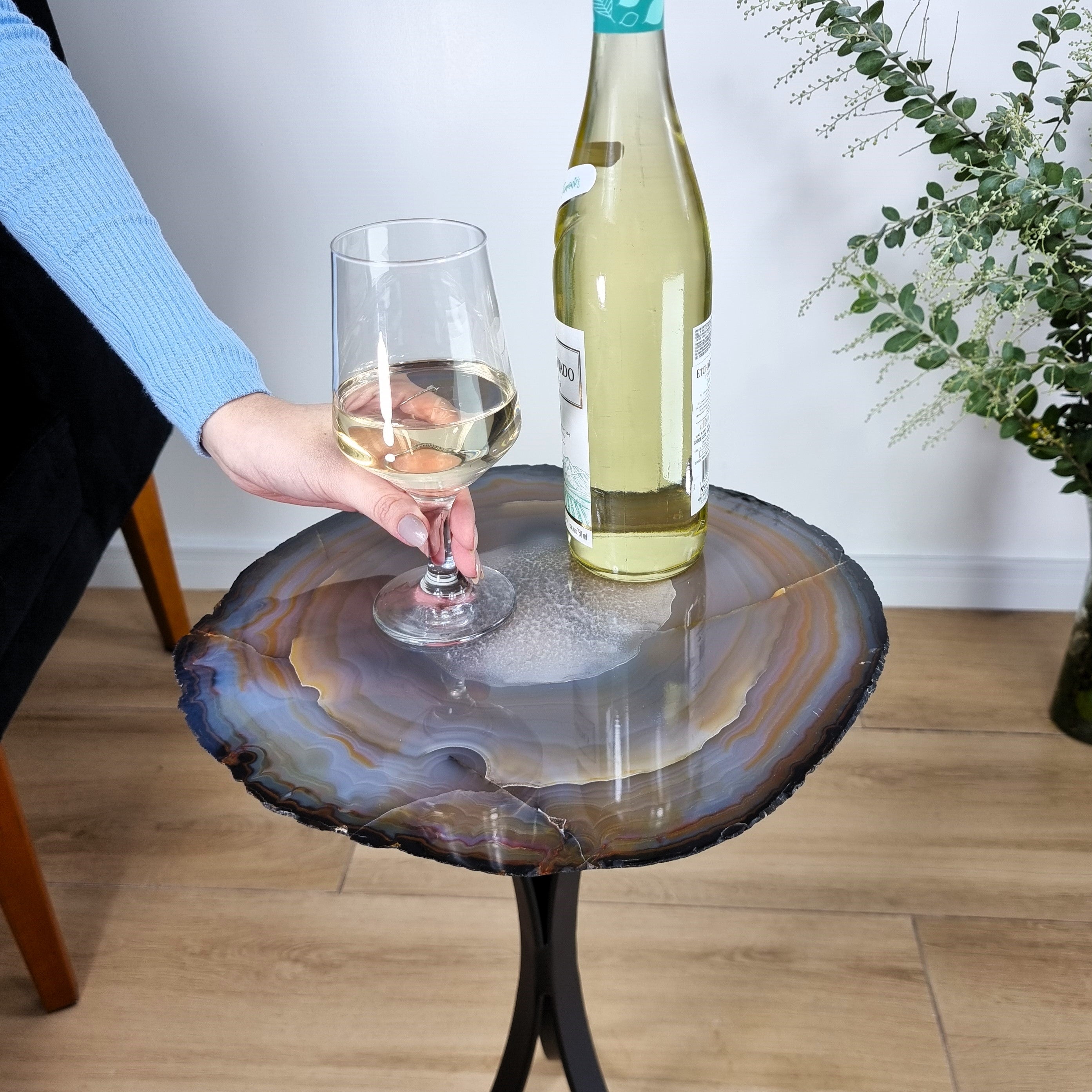 Natural Brazilian Agate Side Table on a black metal base 23 inches high, total weight 11 pounds