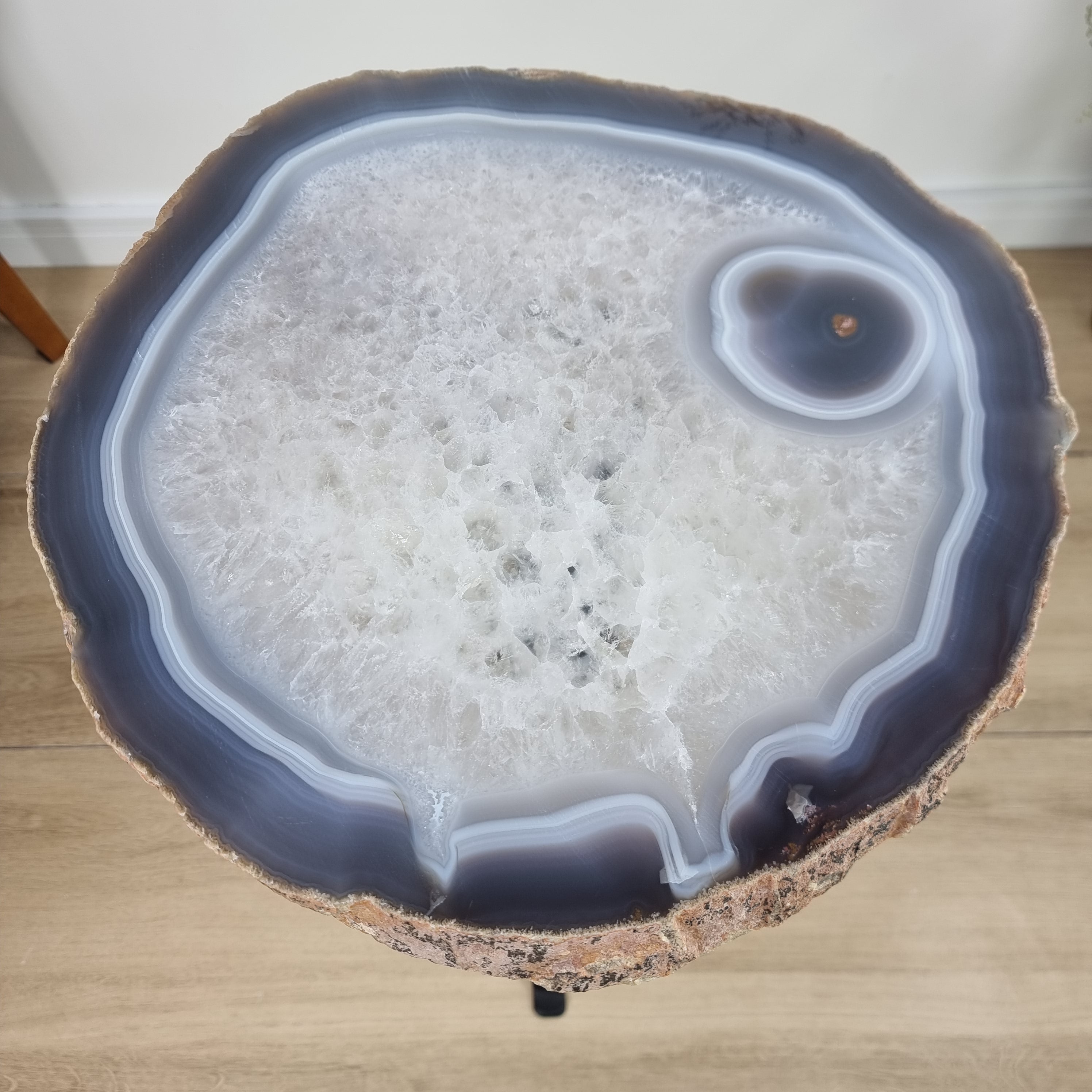 Natural Brazilian Agate Side Table on a black metal base 23 inches high, total weight 16 pounds
