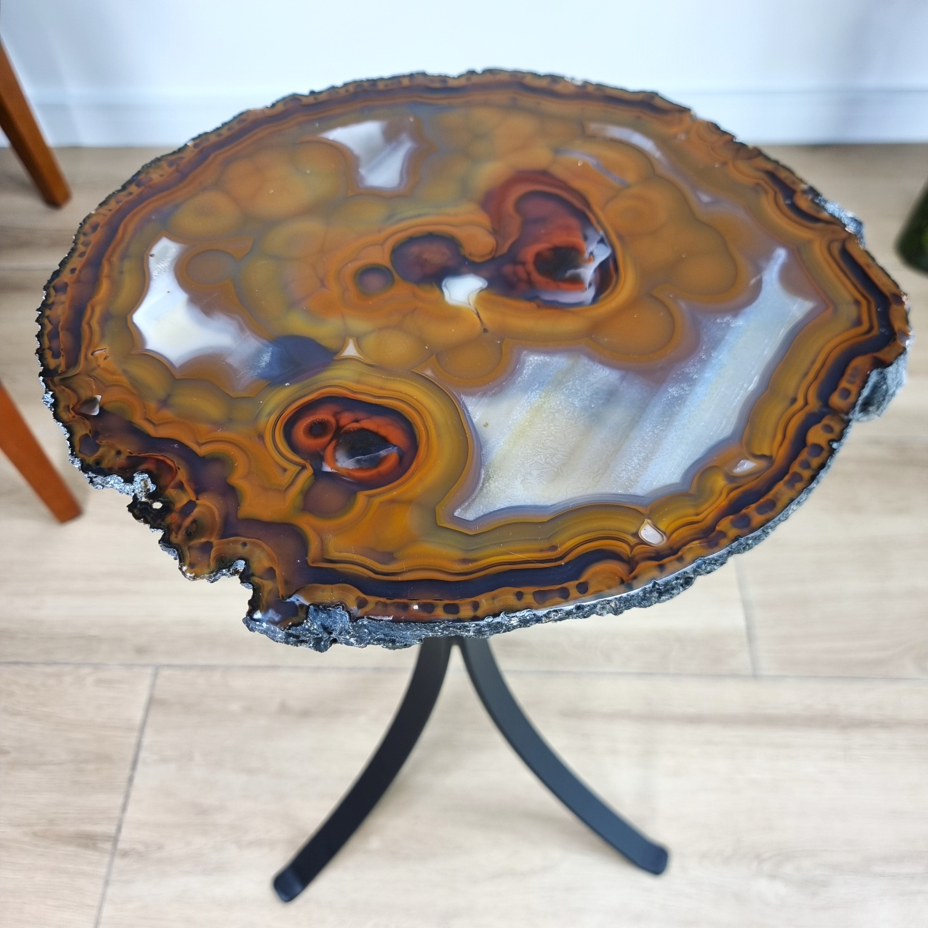 Natural Brazilian Agate Side Table on a black metal base 23 inches high, total weight 14 pounds