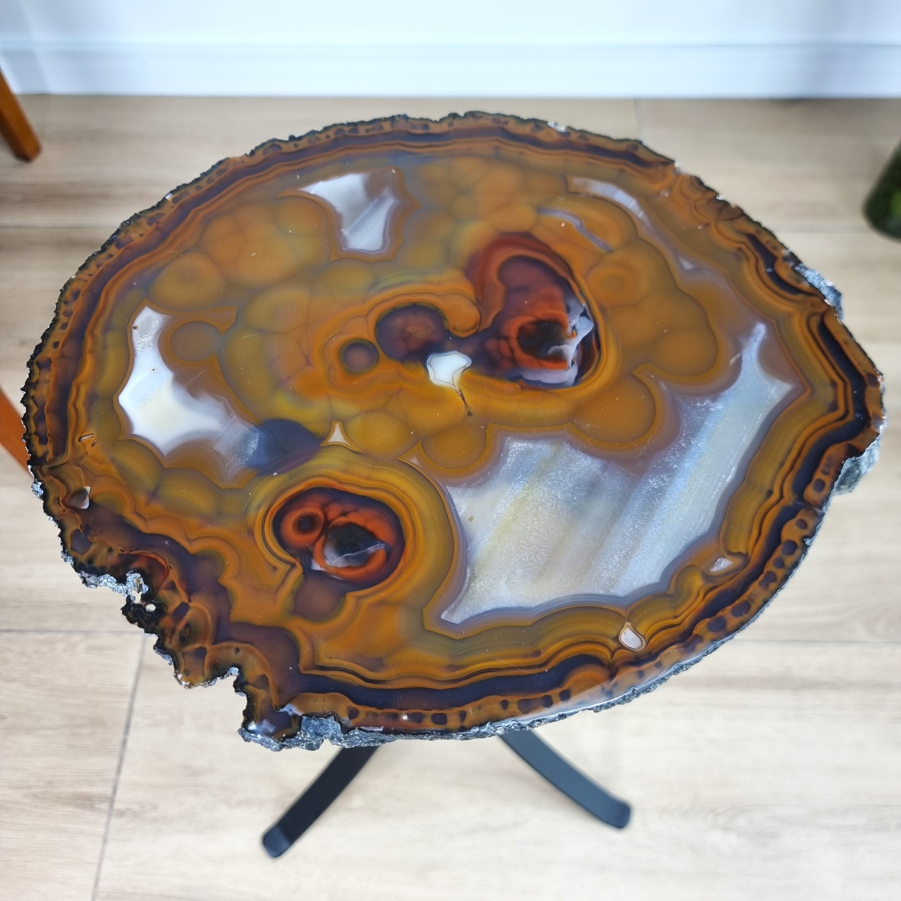 Natural Brazilian Agate Side Table on a black metal base 23 inches high, total weight 14 pounds