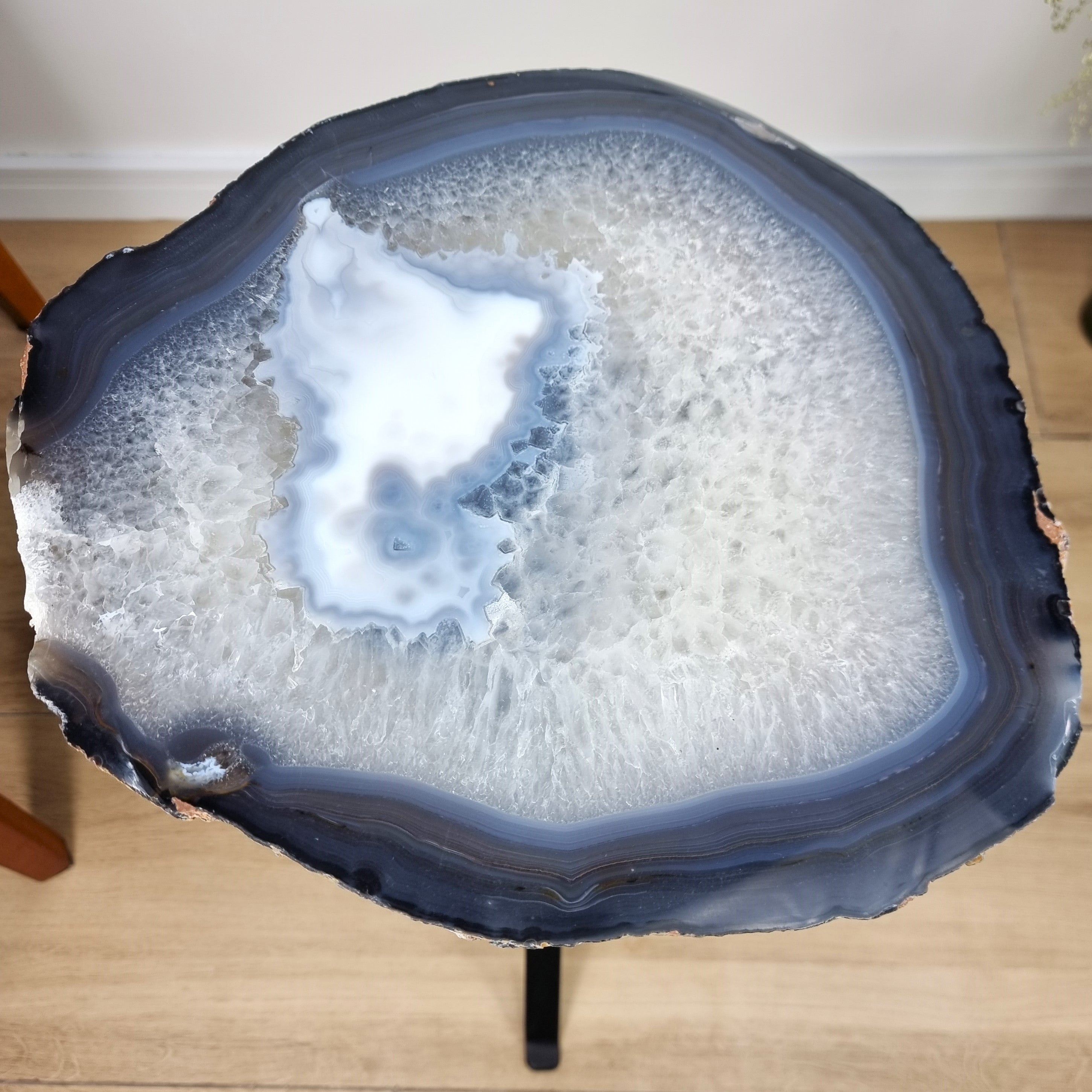 Natural Brazilian Agate Side Table on a black metal base 23 inches high, total weight 17 pounds