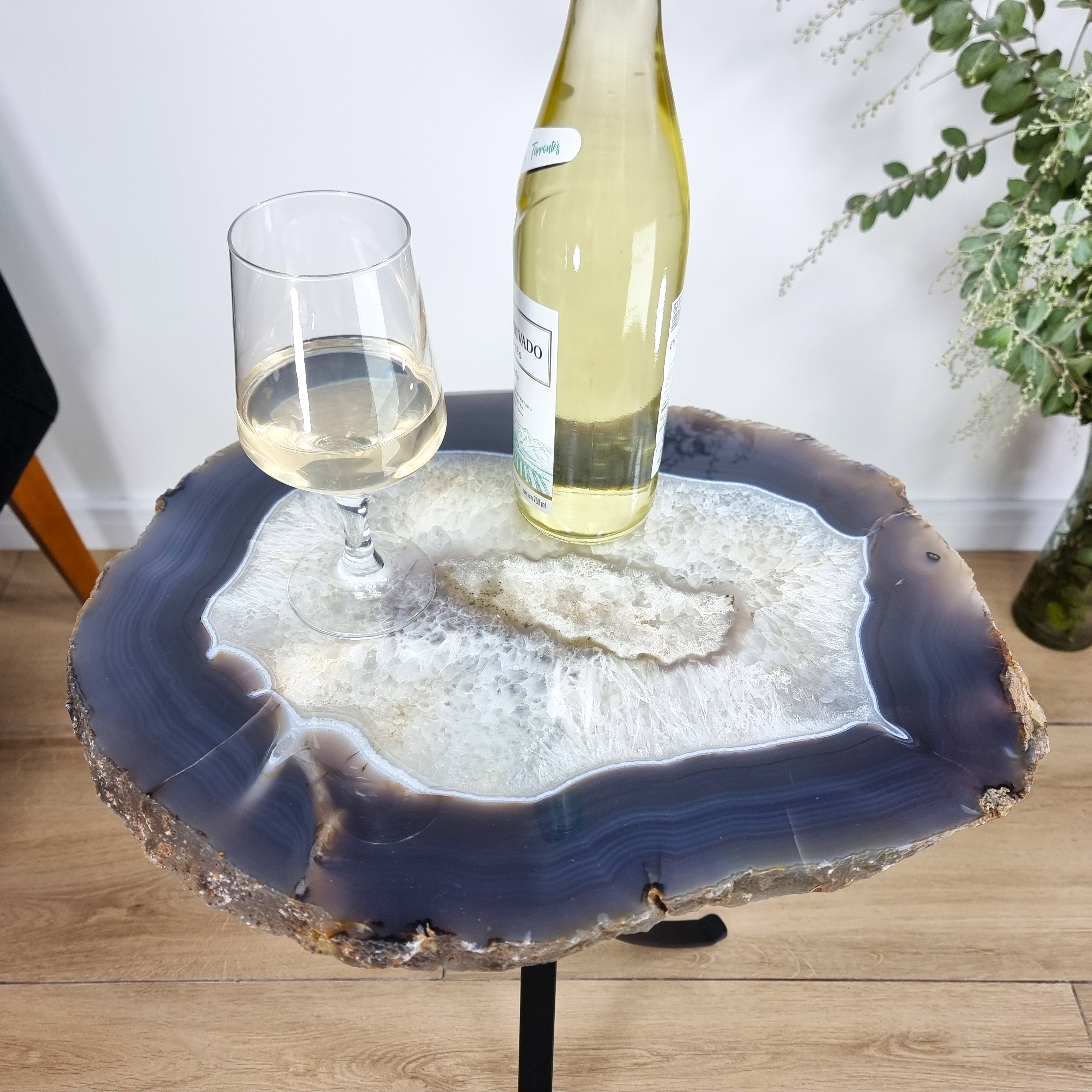 Natural Brazilian Agate Side Table on a black metal base 23 inches high, total weight 20 pounds