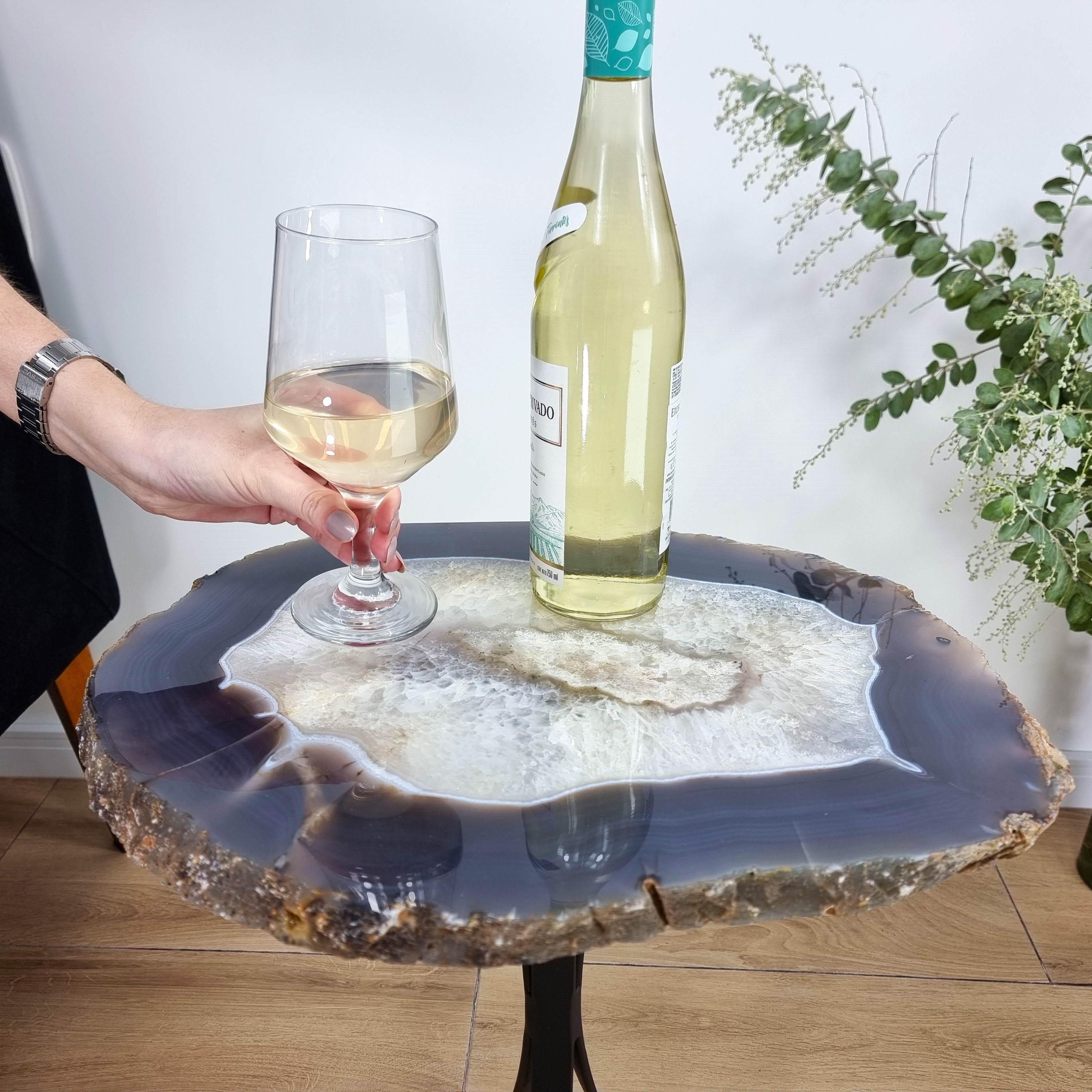 Natural Brazilian Agate Side Table on a black metal base 23 inches high, total weight 20 pounds