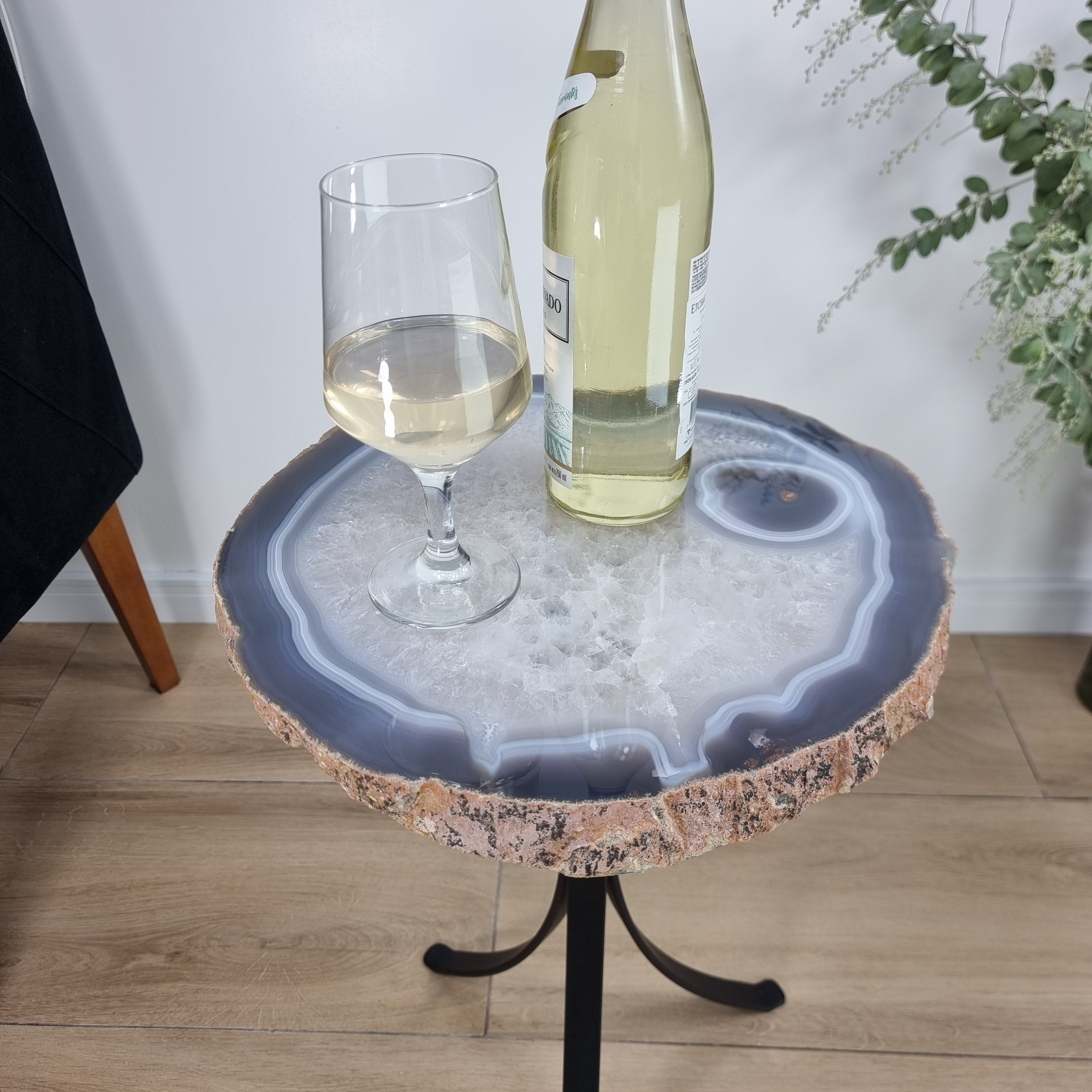 Natural Brazilian Agate Side Table on a black metal base 23 inches high, total weight 16 pounds